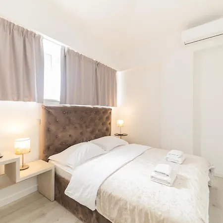 Lukas By Belmont Realty *